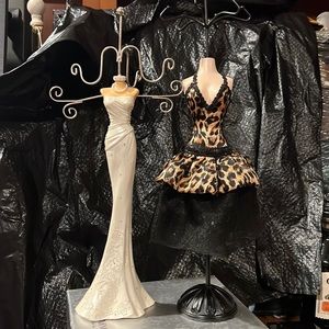 2 jewelry holder. One with white dress and one with leopard dress